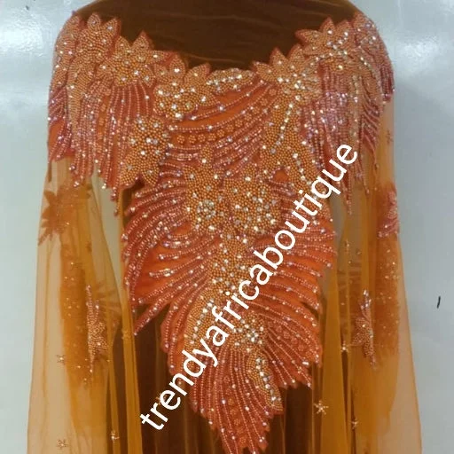 Back in stock: Orange Heavily-beaded/crystal stones net George for making blouses. Popularly use by Igbo/Delta/edo women for big events. Comes in 1.8yds lenght already design for your beautiful blouse Lightweight Floral Blouse Back in stock: Orange Heavily-beaded/crystal stones net George for making blouses. Popularly use by Igbo/Delta/edo women for big events. Comes in 1.8yds lenght already design for your beautiful blouse Lightweight Floral Blouse