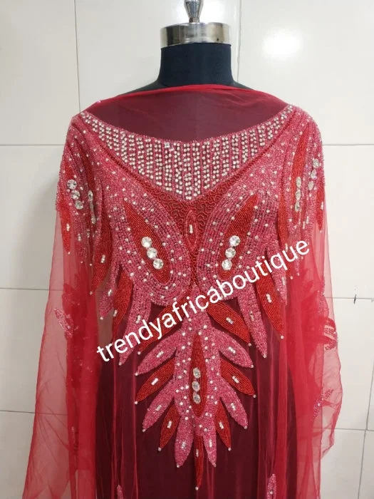 Red Heavily-beaded net for making blouses. Popularly use by Igbo/Delta/edo women for big Occasions. Comes in 1.8yds lenght already design for your beautiful blouse Chic Sleeveless Blouse