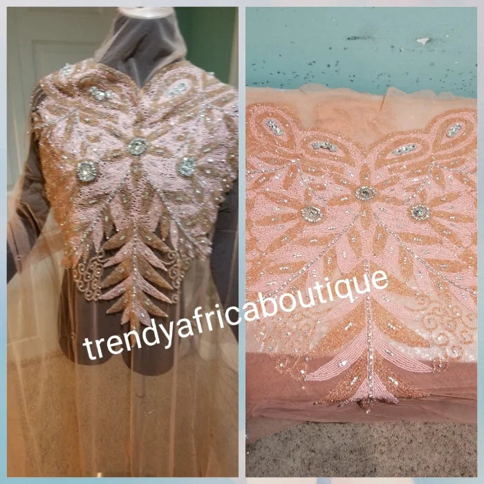 Sweet peach Heavily-beaded net for making modern blouses. Popularly use by Igbo/Delta/edo women for big Occasions. Comes in 1.8yds lenght already design for your beautiful blouse. 1.8yds × 55" width. Modern Oversized Blouse Sweet peach Heavily-beaded net for making modern blouses. Popularly use by Igbo/Delta/edo women for big Occasions. Comes in 1.8yds lenght already design for your beautiful blouse. 1.8yds × 55" width. Modern Oversized Blouse