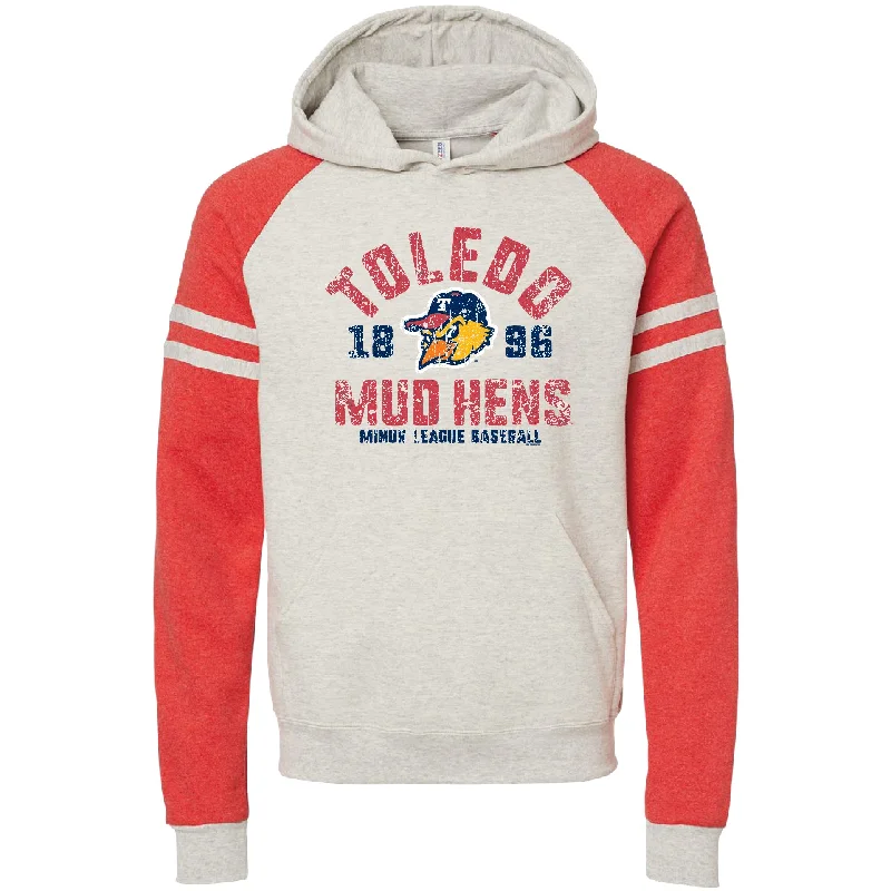Toledo Mud Hens Issues Color Blocked Raglan Hoodie Hoodie with Distressed Vintage Worn Toledo Mud Hens Issues Color Blocked Raglan Hoodie Hoodie with Distressed Vintage Worn